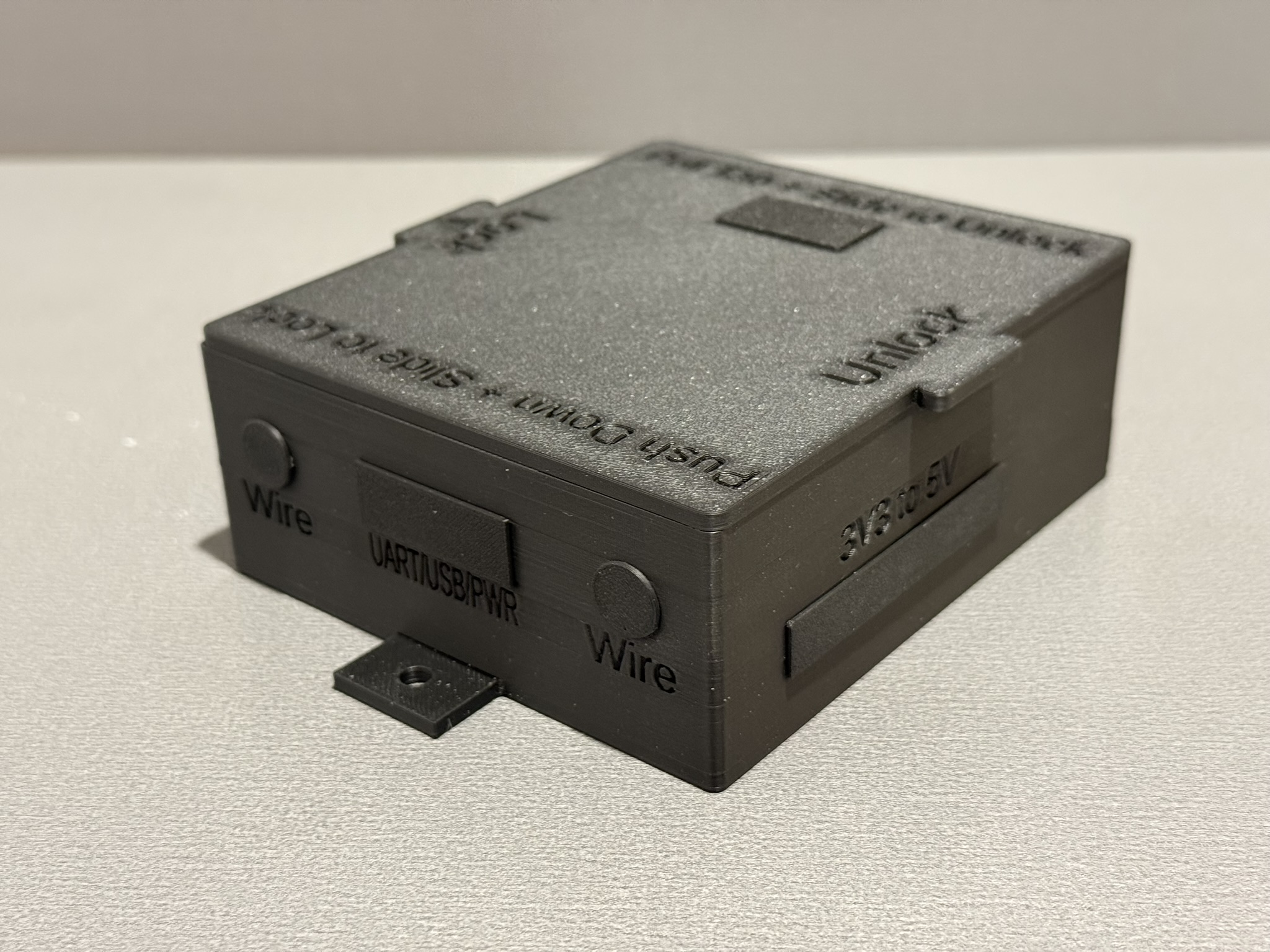 Ranger family enclosure with lid installed in black, shown at an angle