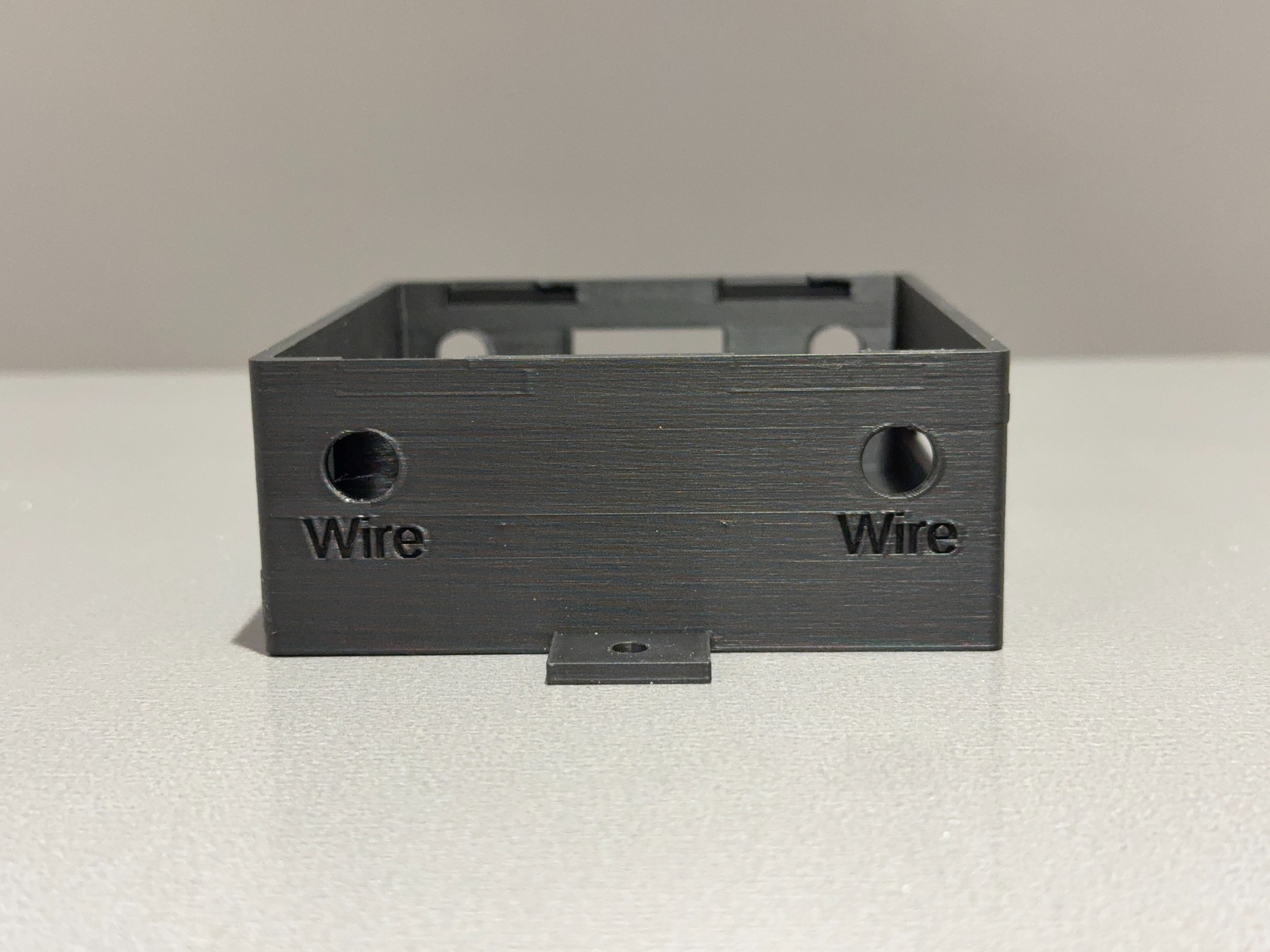 Opposite side detail of the Ranger family enclosure showing wire openings